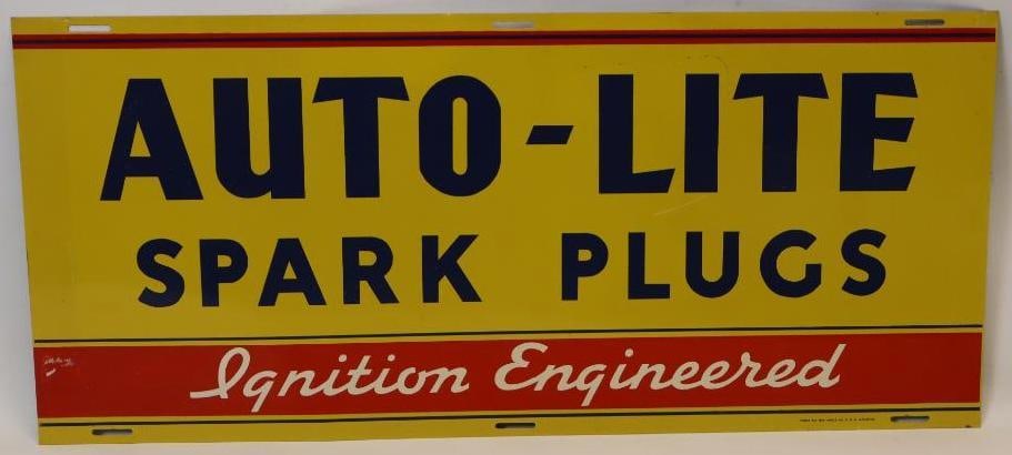 Auto-Lite Spark Plugs "Ignition Engineered" SST Display Rack Sign: This sign is marked Form No 816. This sign measures 30" x 13.25". This sign has bright colors and great gloss. It does show some minor surface wear and scuff to the field. It is graded an 8.9.