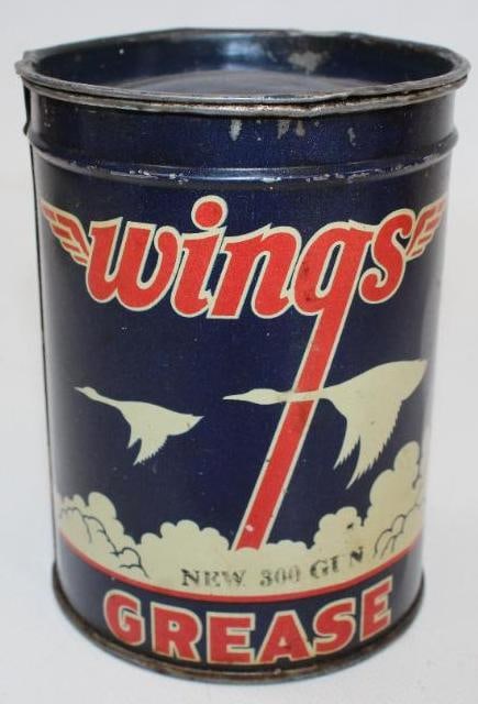 Wings 1lb Grease Can: This can is in very nice condition with only minor wear and slight discoloration. It measures 4.5" x 3.25" x 3.25" and is graded 8.75.