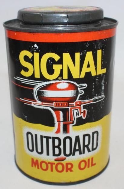 Signal Outboard Round Metal 1 Quart Oil Can: This can shows good color and gloss, with light surface wear to the field. It is empty. It measures 6" x 4" x 4" and is graded an 8.