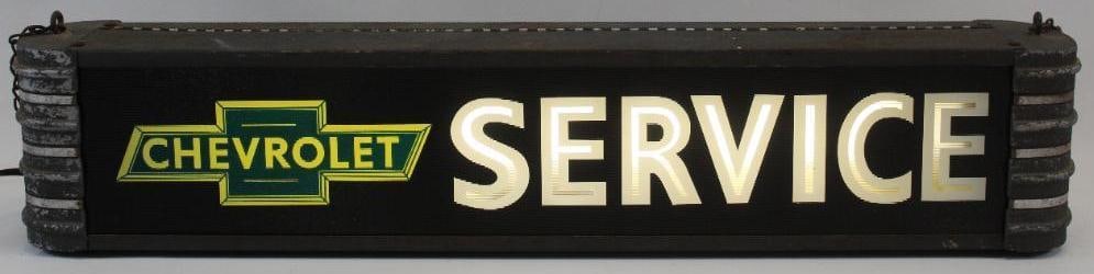 Chevrolet Service Dealership Window Light Up Display Sign: This dealership window display has an all original housing with original paint. The glass advertising display has been replaced with a modern Chevrolet service panel. This sign measures 28" x 6" x 4" 