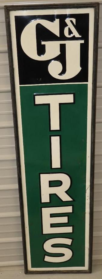 Embossed G&J Tires SST Wood Framed Vertical Sign: This early G&J Tires sign has very good color and gloss throughout with only light wear. There is some light rust staining near the right edge. The wooden frame appears to be all original. The overall