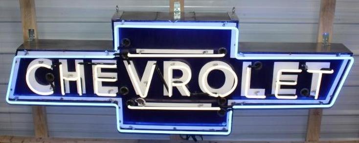 Desirable Chevrolet Dealership Bowtie Neon Porcelain Advertising Sign: This sign has great color and gloss. There is one chip below the V in Chevrolet. This is a very difficult to find Chevrolet sign, and a must have for early dealership collectors. This sign is on a sta