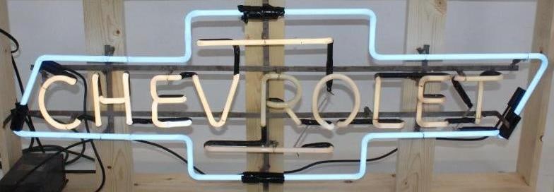 Chevrolet Dealership Bowtie Blue and White Neon Light Up Sign: This neon is in good working condition. The new wood crate measures 55.5" x 12" x 13". The neon itself measures 48" x 15.5"
