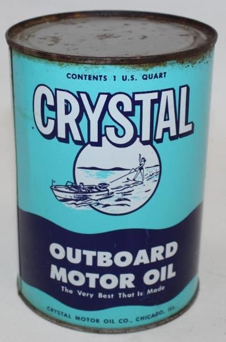 Crystal Outboard Round Metal 1 Quart Oil Can: This can has good color and gloss throughout. The display side shows some edge wear along the top with heavier edge wear on the reverse. It is graded 8.25 and 8. It measures 5.5" x 4" x 4" and it rema
