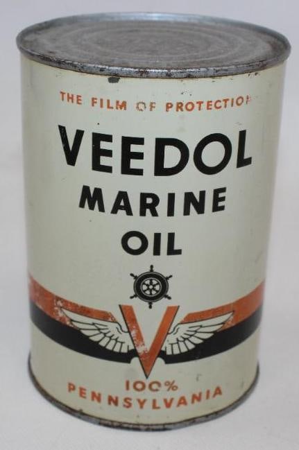 Rare Veedol Marine Round Metal 1 Quart Oil Can: This is a very difficult to find Veedol Marine quart can. This can displays well with only some slight fading to the red areas. It has been drained by two holes in the bottom lid. It measures 5.5" x 4