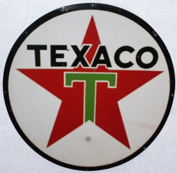 Texaco DSP Porcelain 6 Ft Service Station Identification Sign: Each side of this sign shows good color and gloss througout. There are a few chips throughout the field. This sign measures 71.5" Diameter. It is graded an 8.25 on both sides.