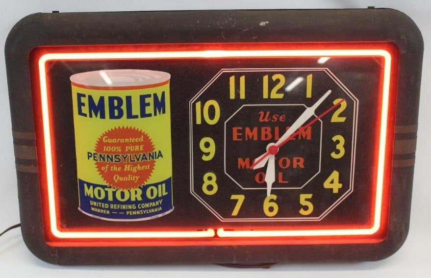 Use Emblem Motor Oils Neon Advertising Clock: This clock is in its original housing. It retains all of its original finish. The cord has been replaced and the age of the glass panel is unknown. The clock is in excellent overall condition. It ligh
