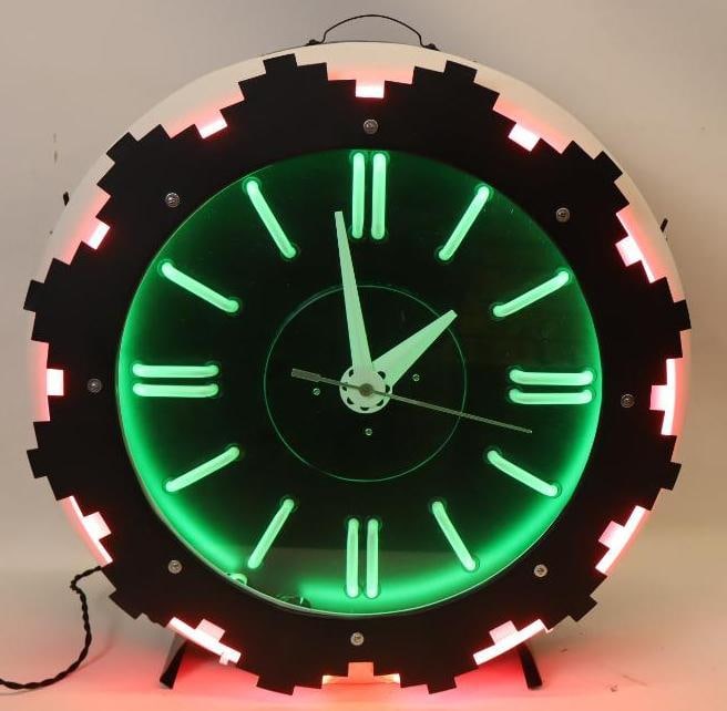 Fully Restored Aztec Electric Neon Cleveland Clock: This clock is in excellent overall condition as it has been fully restored. It is fully operational keeping time and lighting up. This clock measures 26" x 26" x 8".