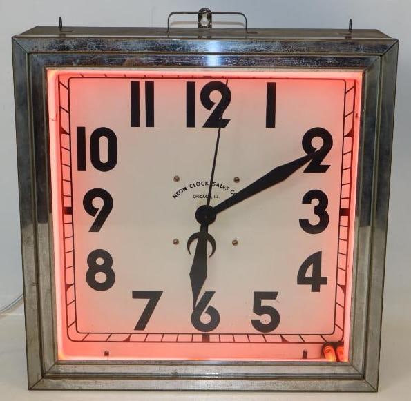 Neon Clock Sales Co. Chicago Neon Clock: This clock is all original with face, outer glass and can, while the can retains its original paint. This clock is marked Neon Clock Sales Co. Chicago. The neon lights up and the clock keeps time. It 