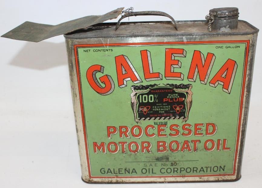 Graphic Galena Motor Boat Oil 1 Gallon Oil Can: The display side is in very nice condition with only light wear. The reverse has slightly heavier staining and wear. It retains it's original shipment hanging tag and has it's original contents. It me