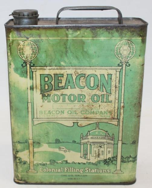 Colonial Beacon 1 Gallon Motor Oil Can: This early can has great service station graphics. The display side shows some fading and rust staining while the reverse has heavier rust staining. It is graded a 7.5 and 7. The measurements are 11" 