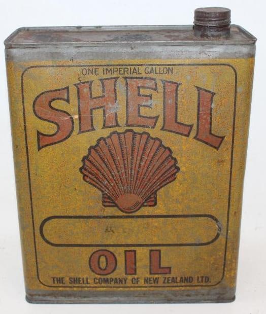 Shell Motor Oil 1 Imperial Gallon Oil Can: This is an early Shell Oil Company of New Zealand can with an embossed Shell logo on the top. The display side has fading and discoloration and the reverse has heavier paint loss along the left side. 