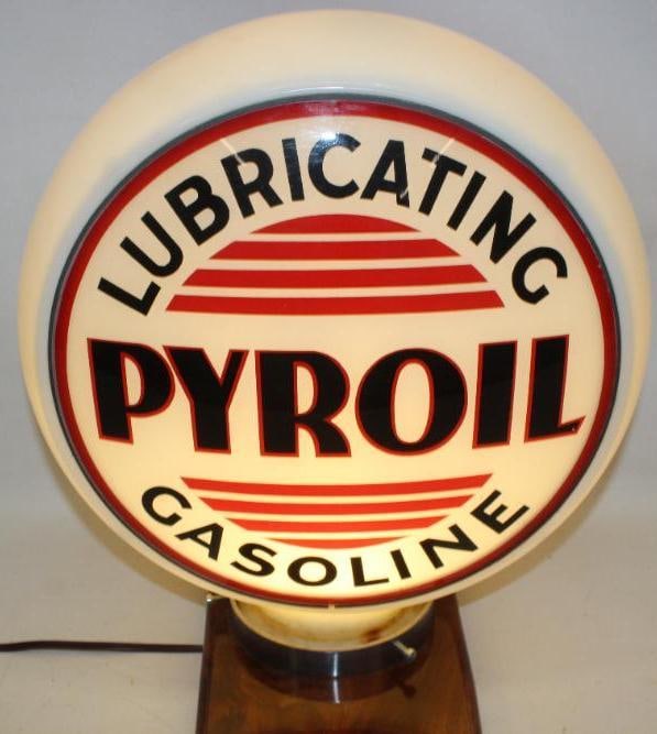 Complete Pyroil Gasoline 14" Gas Pump Globe on Banded Milk Glass Body: The display lens on this globe is in very nice overall condition. The reverse shows some slight discoloration and staining. This difficult to find 14" banded body is in very nice condition with no cra