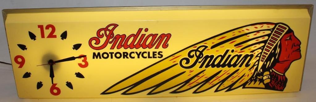 Graphic Indian Motorcycles Dealership Light Up Advertising Display Sign and Clock: This excellent display piece shows vivid colors to the Indian headdress and writing. It is in excellent overall condition. There is some minor discoloration to the white areas which is normal for this