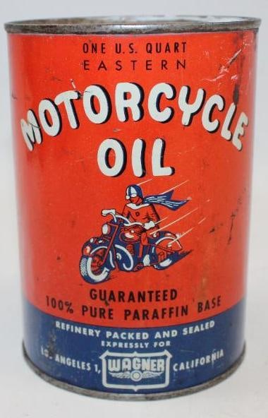 Graphic Wagner Motorcycle Metal One Quart Oil Can: This is a highly desirable motorcycle oil can with very detailed graphics. It does show some slight wear and scratches to the field and on the reverse but displays well. It measures 5.5" x 4" x 4" and