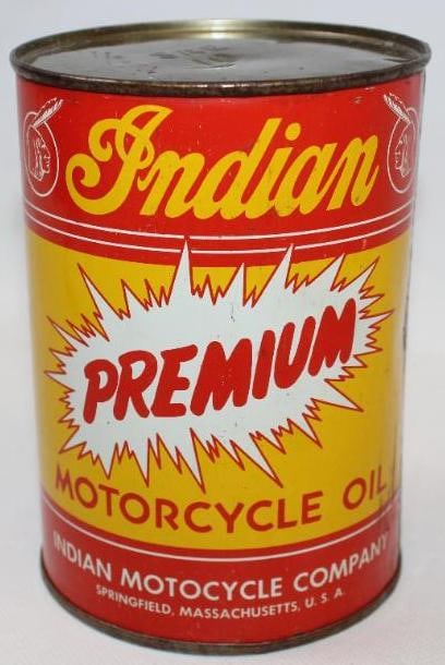 Indian Premium Motorcycle Oil Metal One Quart Oil Can: This can has good color throughout with only minor surface wear to the field. There are some light scratches near the seam. It has been drained by two small holes in the bottom lid. It measures 5.5" x