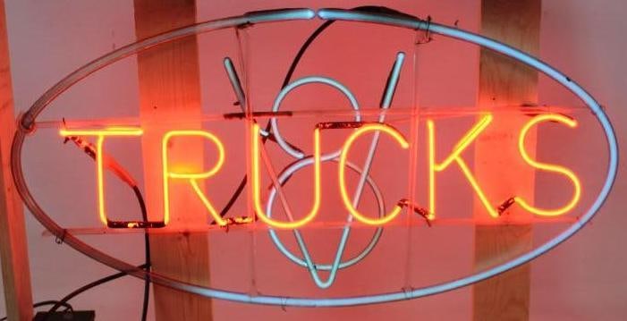 Ford V8 Trucks Dealership Red and Blue Neon Light Up Sign: This neon is in good working condition. The new wood crate measures 43.75" x 12" x 13". The neon itself measures 34.5" x 17.5"