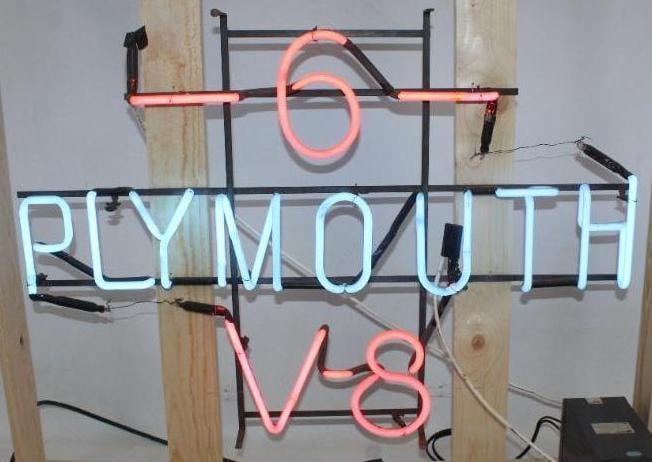 Plymouth 6 and V8 Dealership Pink and Blue Neon Light Up Sign: This neon is in good working condition. The new wood crate measures 45.5" x 12" x 12". The neon itself measures 37.75" x 26".