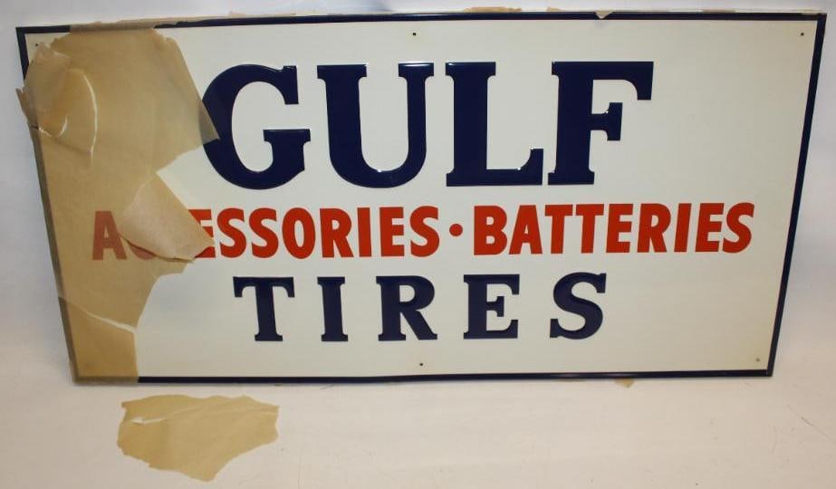 NOS Gulf Tires, Batteries, and Accessories Embossed SST Advertising Sign: This sign is in excellent condition with great color and gloss. There is one minor surface scratch shown in the field. It does retain some of the original rice paper from shipping. The rice paper is n