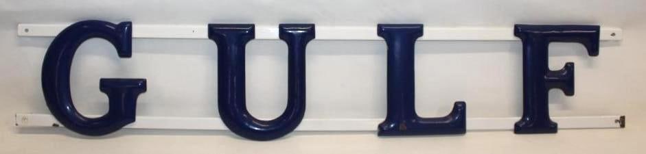 Gulf Porcelain Embossed Channel Letter Gas Service Station Sign: These embossed porcelain letters are attatched to the original porcelain rails. They are in very nice condition with only some minor fading to the blue, and a few small chips and edge wear. This sign 