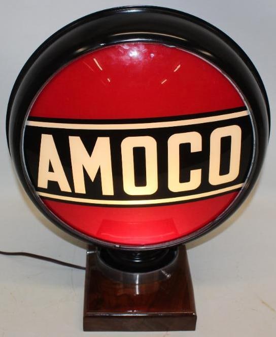 Amoco Gasoline 15" Single Gas Pump Globe Lens on Metal Body: The lens is in very nice condition. There is a blank lens on the reverse. The lens measures 15" in diameter and the overall measurments are 19" x 17" x 8".