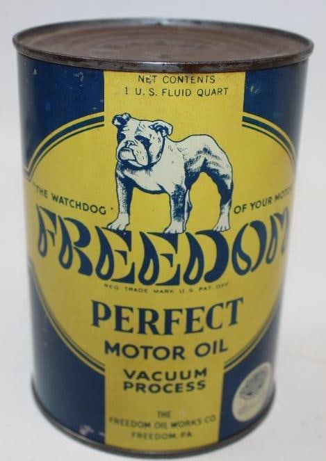 Freedom Perfect Vacuum Process Metal One Quart Oil Can: This is a great early Freedom can with very good color throughout and only light wear to the display.There is a rust spot on the reverse near the seam. It measures 5.5" x 4" x 4". It has been drained 