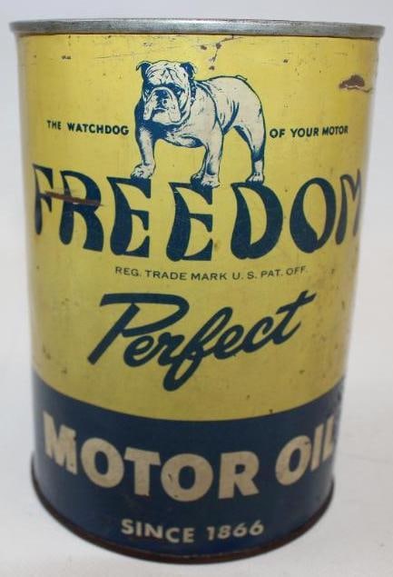 Freedom Perfect Metal One Quart Oil Can: This can displays well but does have some light wear and scratches throughout, as well as some minor rust staining. The top lid has been replaced. It measures 5.5" x 4" x 4" and is graded 8.