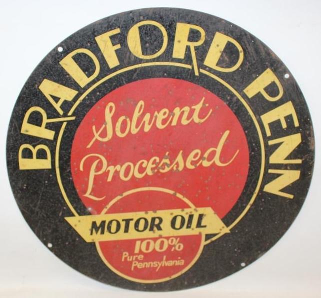 Bradford Penn Solvent Processed Motor Oil DST Advertising Sign: This is a rare early Bradford Penn sign. It does show severatl indentations throughout the field as well as rust staining and surface scratches to both sides.This sign measures 23.5" x 23.5". It is gr