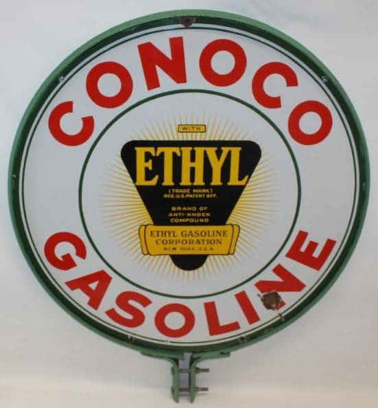 Conoco Gasoline with Ethyl 30" DSP Porcelain Advertising Sign with Ring: The display side of this sign shows very good color and gloss with only one chip in the N of gasoline. The reverse side shows some minor discoloration to the black area, as well as some chipping to th