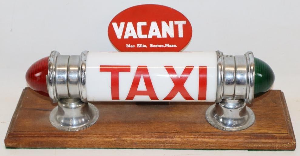 Early Taxi Cab Roof Top Light with Vacant License Plate Topper: Both the taxi rooftop light and license plate topper are mounted to a wood base. Both pieces are marked MacEllis. They are in very good condition overall with only minor wear. The overall measurments 