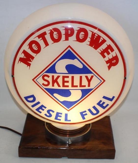 Complete Skelly Motopower Diesel Fuel 13.5" Gas Pump Globe on Hull Milk Glass Body: The display lens on this globe has some slight discoloration along the bottom edge. The reverse has some slight staining along the top. The hull body is in excellent condition with a copper screw base
