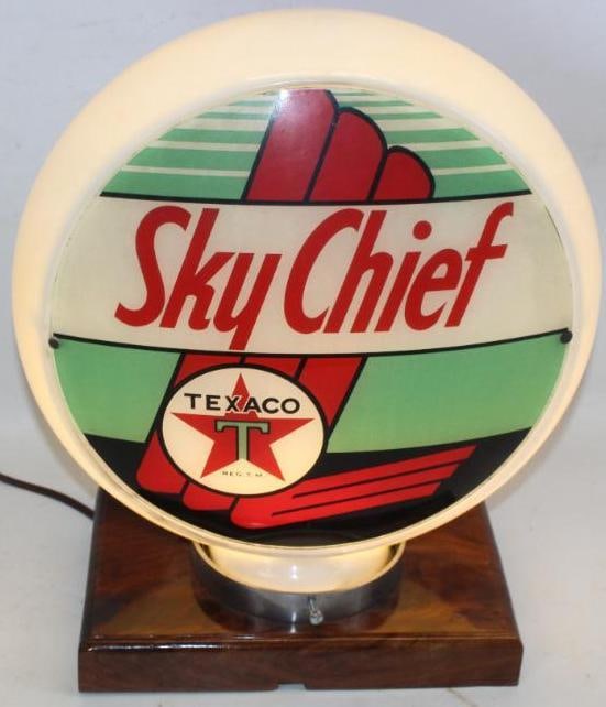 Complete Texaco Sky Chief 13.5" Gas Pump Globe on Narrow Milk Glass Body: The display side of this globe is in good overall condition. While the reverse is also nice it has one tiny thumbnail chip at the lower left edge. The body is also in very good condition with no chips