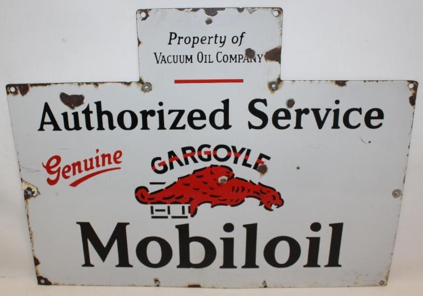 Vacuum Oil Company Gargoyle Mobiloil Authorized Service SSP Porcelain Rack Sign: This sign has good color and gloss throughout with a few chips to the field. There are additional chips at the perimeter and mounting holes. This sign measures 30" x 22.75" and is graded an 8.25.