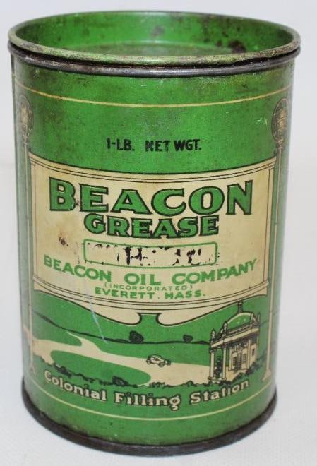 Colonial Beacon 1lb Grease Can: The display side shows some light staining with slightly heavier staining on the reverse. It measures 4.5" x 3.25" x 3.25". It is graded 8 and 7.5.