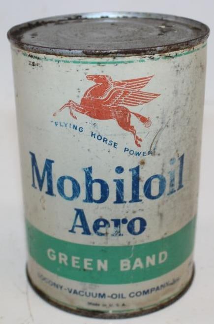 Socony-Vacuum Mobiloil Aero Green Band One Quart Metal Oil Can: This is a very difficult to find green band version of this can. It shows fading and wear throughout both sides of the field. This oil can is full. This can measures 4" x 4" x 5.75". It is graded a 7.