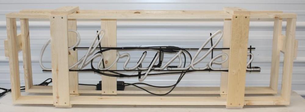 Chrysler Dealership Window Neon: Pick up only, will not ship. When plugged in 'Chry' will blink but does not stay lit, comes in new wooden crate, it measures 62" x 13" x 21" neon measures 50" x 10" x 2"