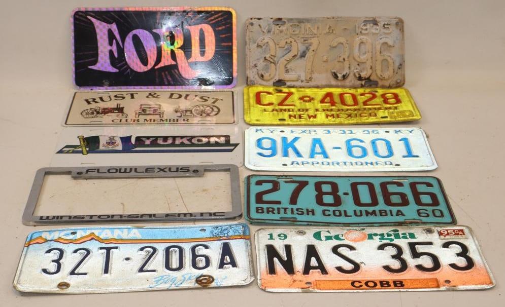 Group of 10 Embossed License and Booster Plates (1 of 9)