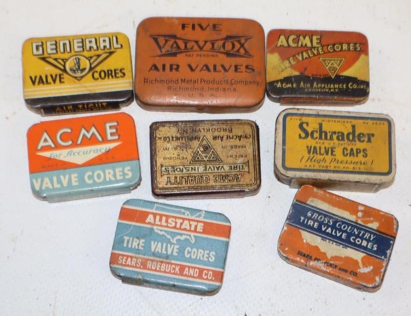 Group of 8 Different Tire Valve Tins: Largest is 1.75x1.25
