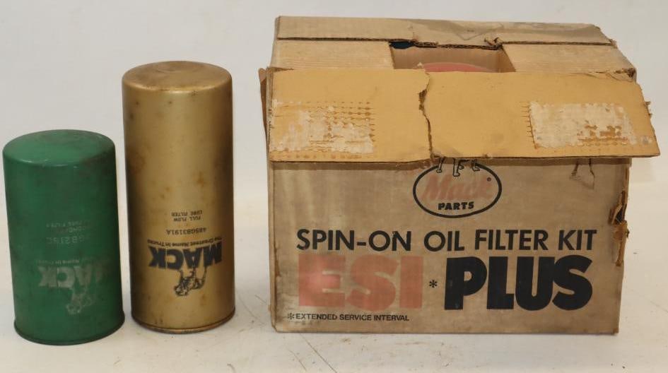 Group of 8 Mack Truck Oil Filters: Largest is 4x4x10-- 6 are in Original Case