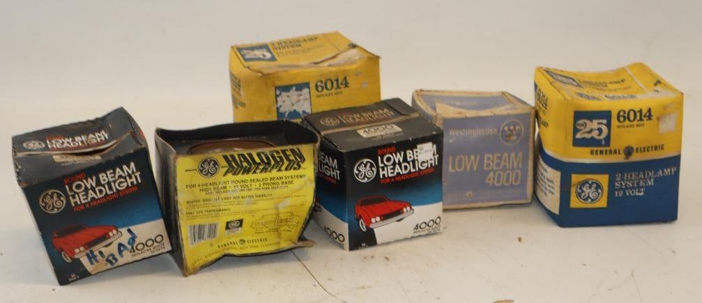 Group of 6 Automobile Head Lamp Lights in Original Boxes: Largest is 6x6x6