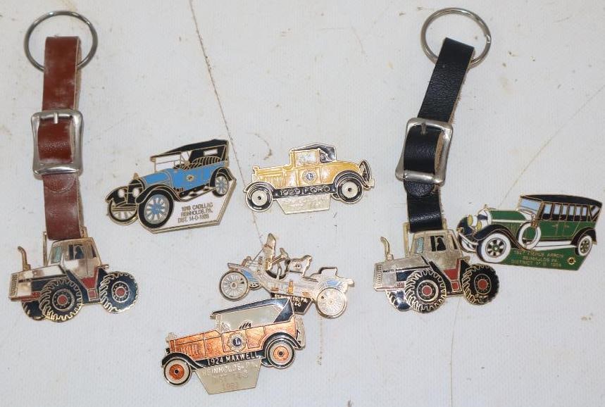 Group of 7 Card Club Pins and Tractor Watch Fobs: Largest is 2x4.5