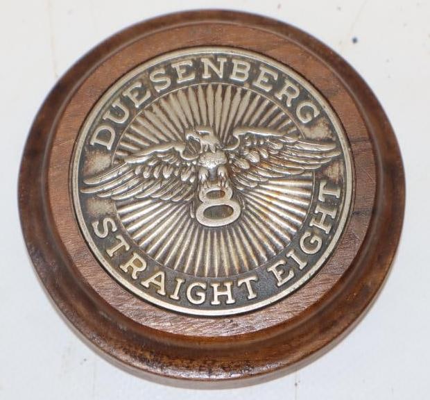 Duesenberg Straight 8 Hubcap Emblem Mounted On Wood Base: 3.5x3.5x1