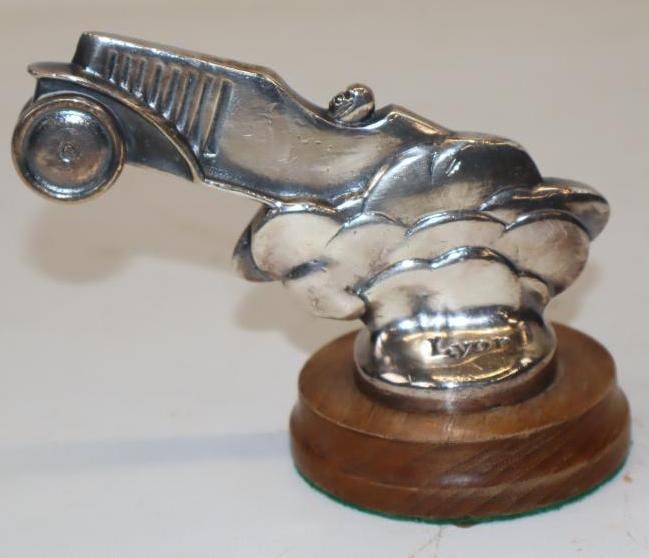 "A Car In The Clouds" Early Automobile Radiator Mascot Mounted On Wood Base: 5x3x2 Is Marked Lyon