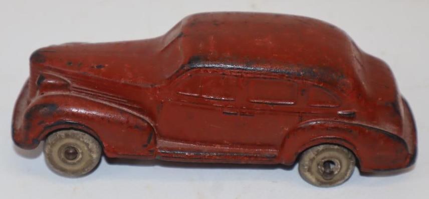 1930's Auburn Rubber Corp. Red Sedan Car with Rubber Wheels: 4.75" x 1.5" x 1.5" missing rear right wheel