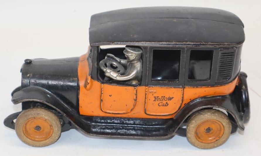Cast Iron Arcade Yellow Cab Taxi with Rubber Wheels: 9" x 3.5" x 4.5"