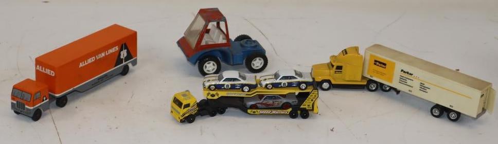 Group of 4 Toy Semi Trucks and Tractor: Largest is 11.5x2x2.5