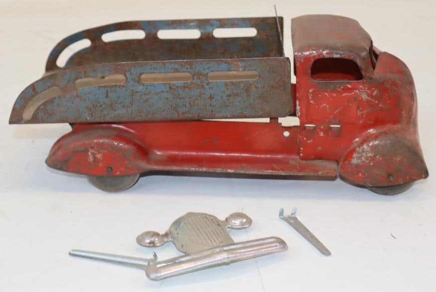 1930s Pressed-Steel Toy Dump Truck With Wooden Wheels: 11x4.5x4