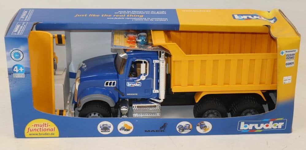 Bruder Grante Dump Truck In Original Box: 25.5x8x10 Box Has Water Damage