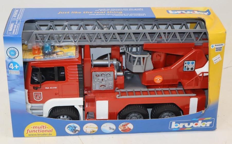 Bruder Fire Truck In Original Box: 20x7x10.5 Box Has Water Damage