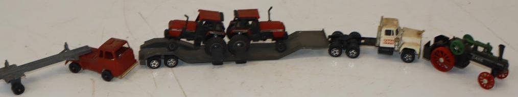 Group of 2 Toy Semi Trucks With Tractor: Largest is 11x1.5x2.5
